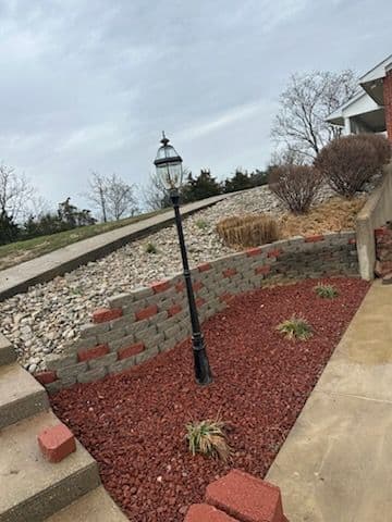 Elevated Design with Terraced Retaining Wall
